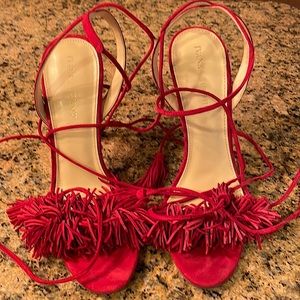 This is an Ivanka Trump 4 inch heel in fire engine red, in swede material.